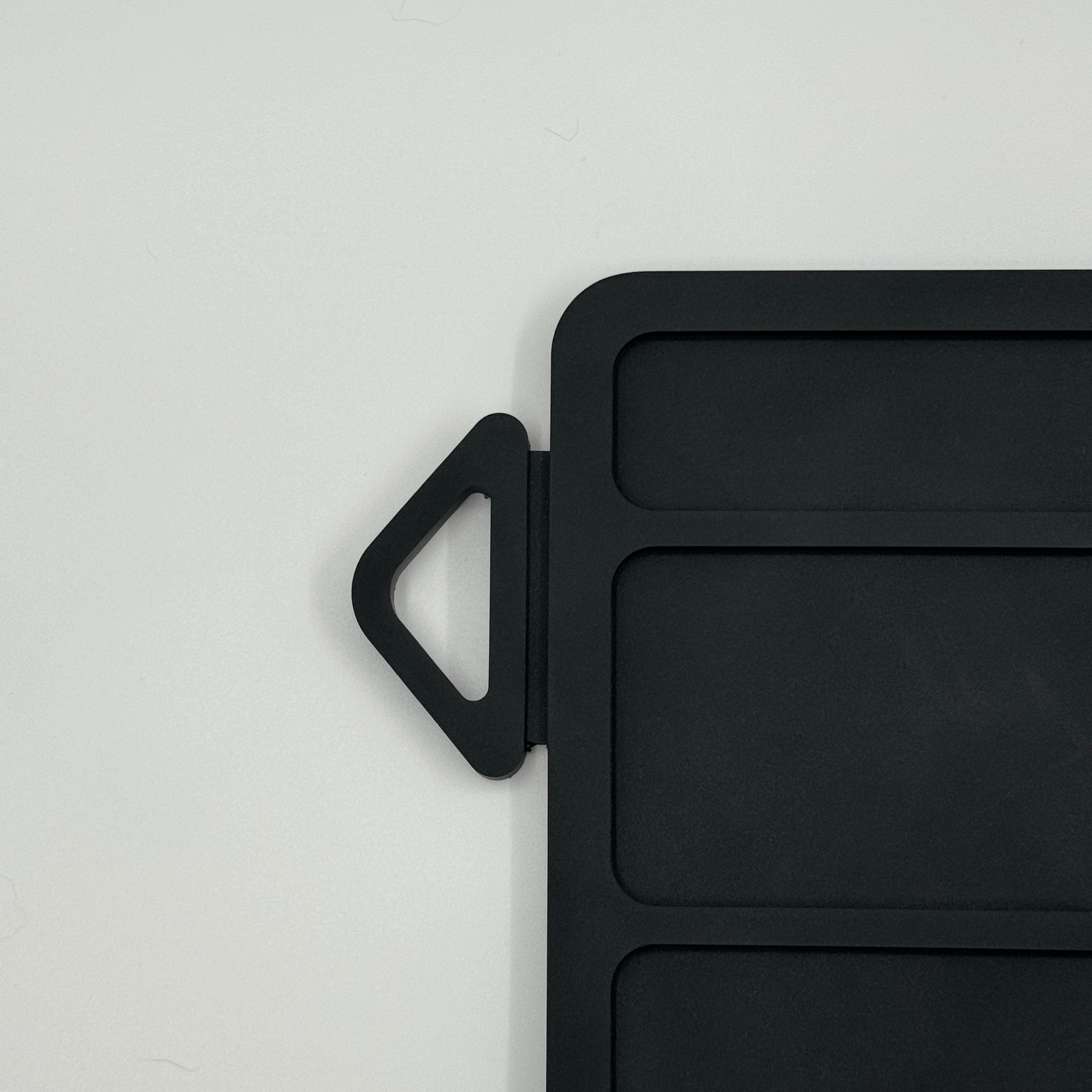 Forsaken Industries Magnetic Weapons Cleaning Mat corner detail with integrated hanging loop