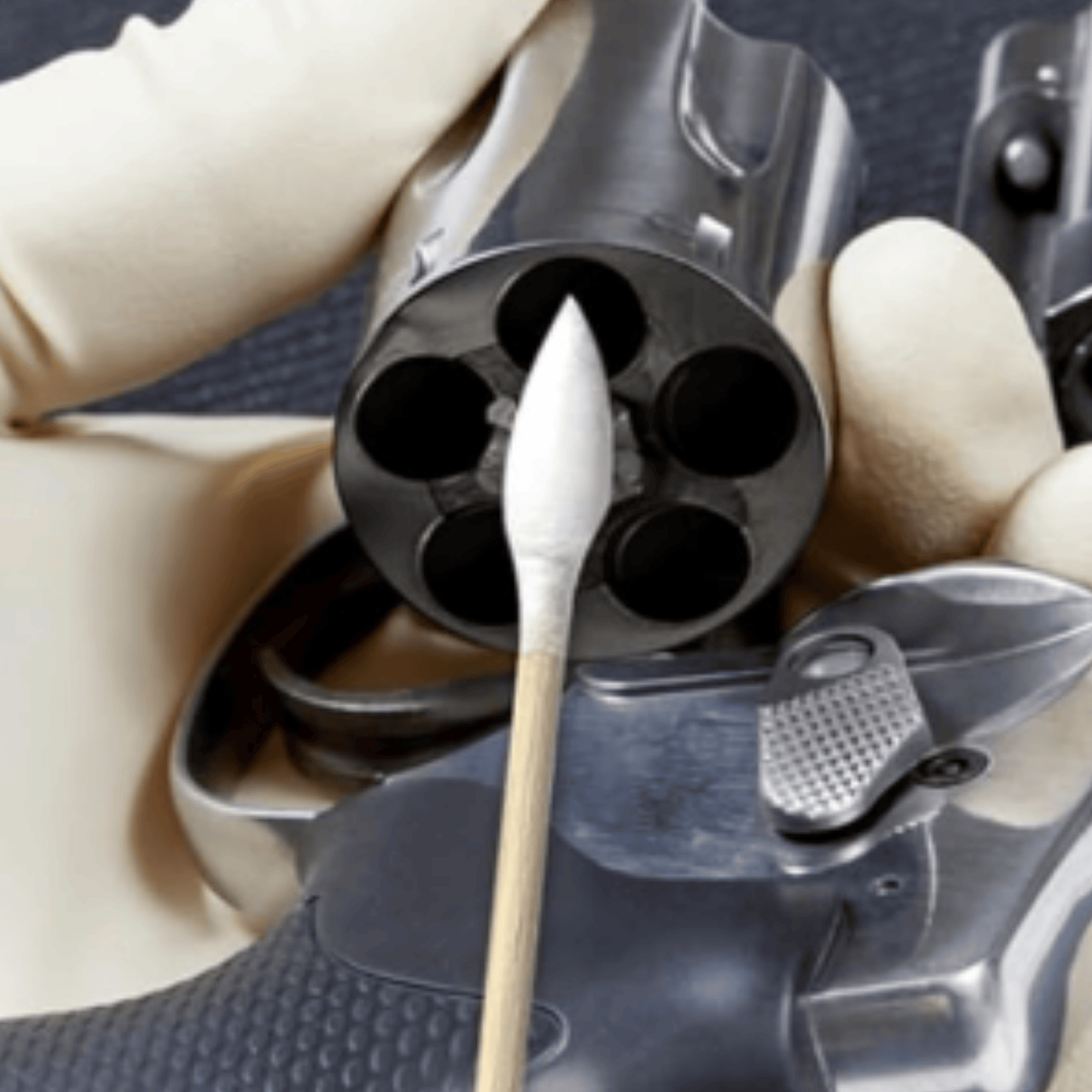 Using Forsaken Industries 6-Inch Pointed Bamboo Cotton Swab to precision clean revolver cylinder and firearm components