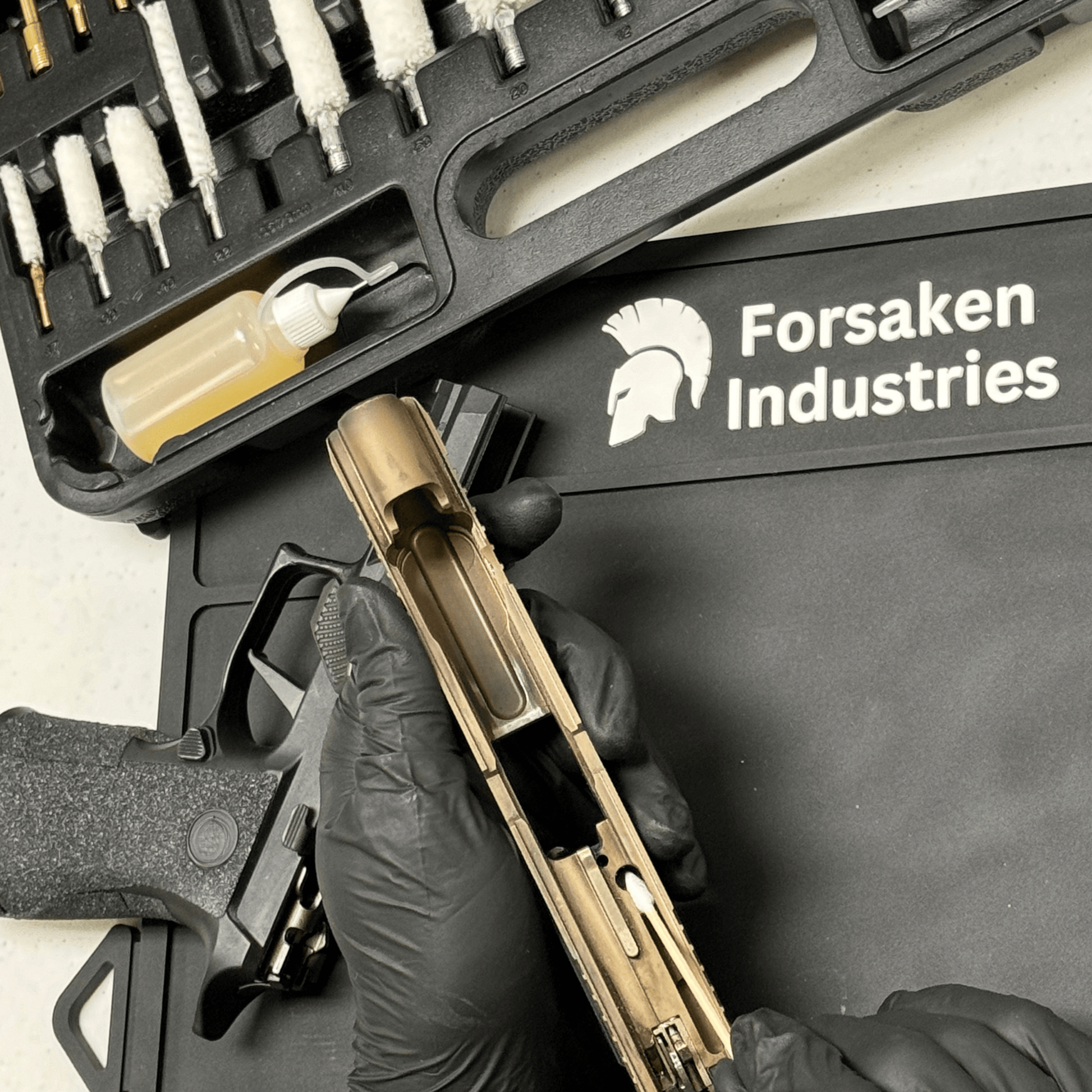 Using Forsaken Industries 6-Inch Pointed Bamboo Cotton Swabs for precision firearm cleaning on Magnetic Weapons Cleaning Mat — Advanced Gun Maintenance Bundle